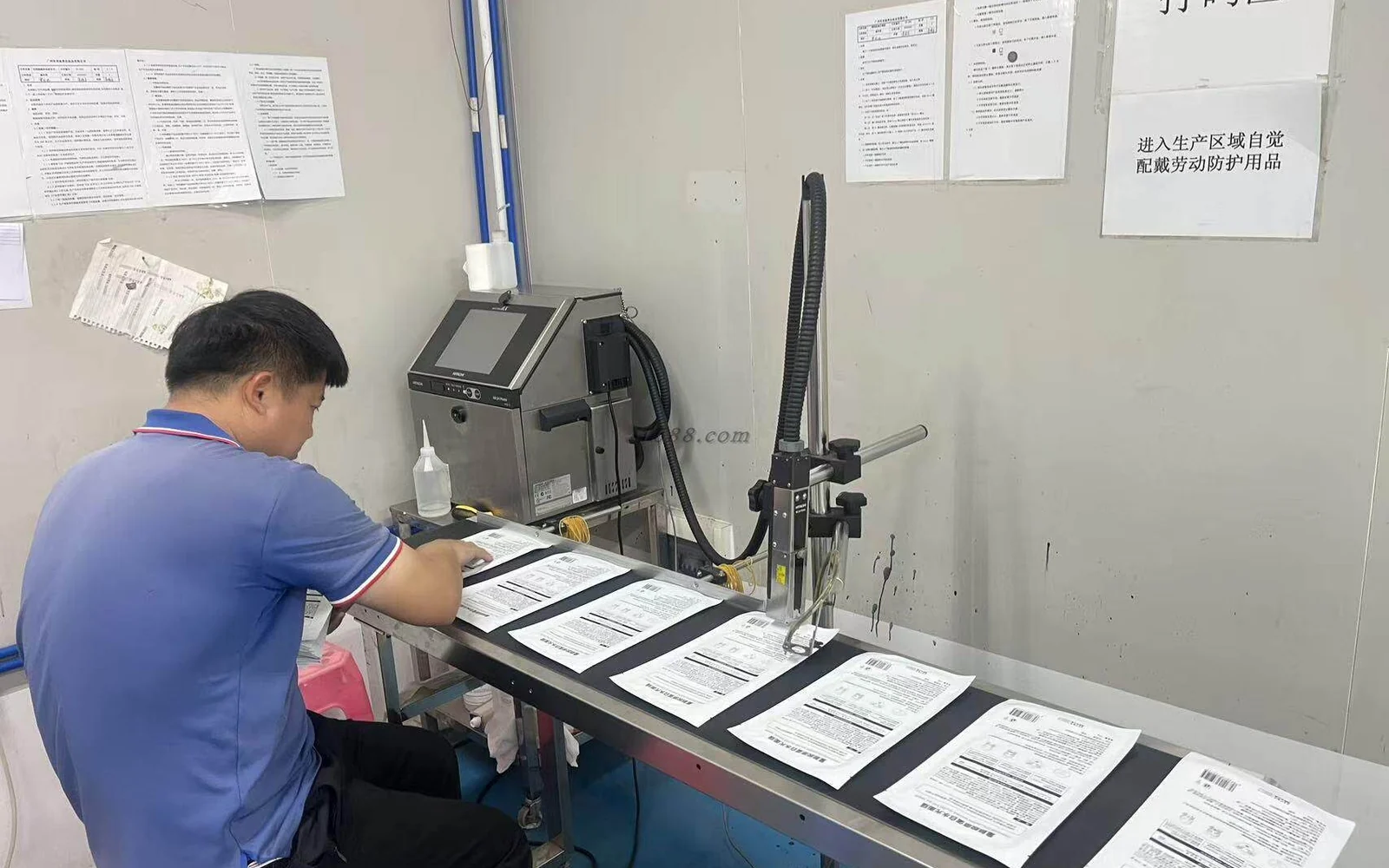 Quality-control documentation station at the Sandio Cosmetics factory